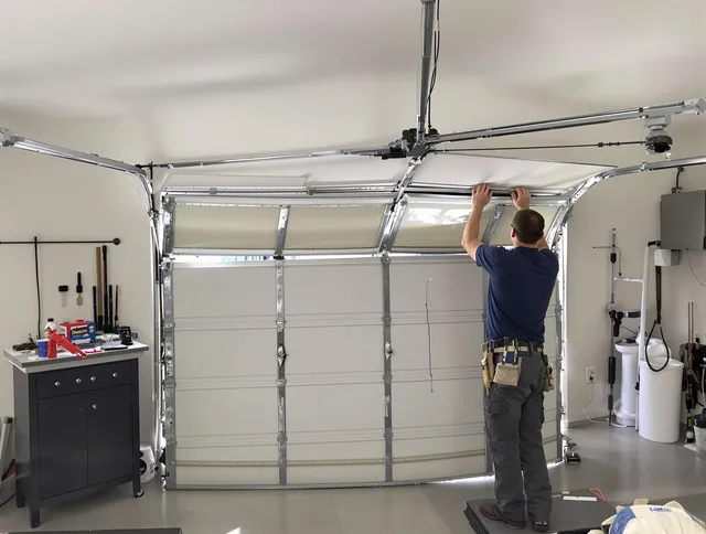 Upland Garage Door Repair specialist performing precise section replacement on Upland garage door