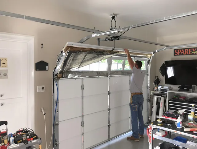 Garage door section replacement by Upland Garage Door Repair in Upland