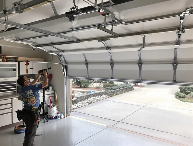 Garage door track repair service by Upland Garage Door Repair in Upland